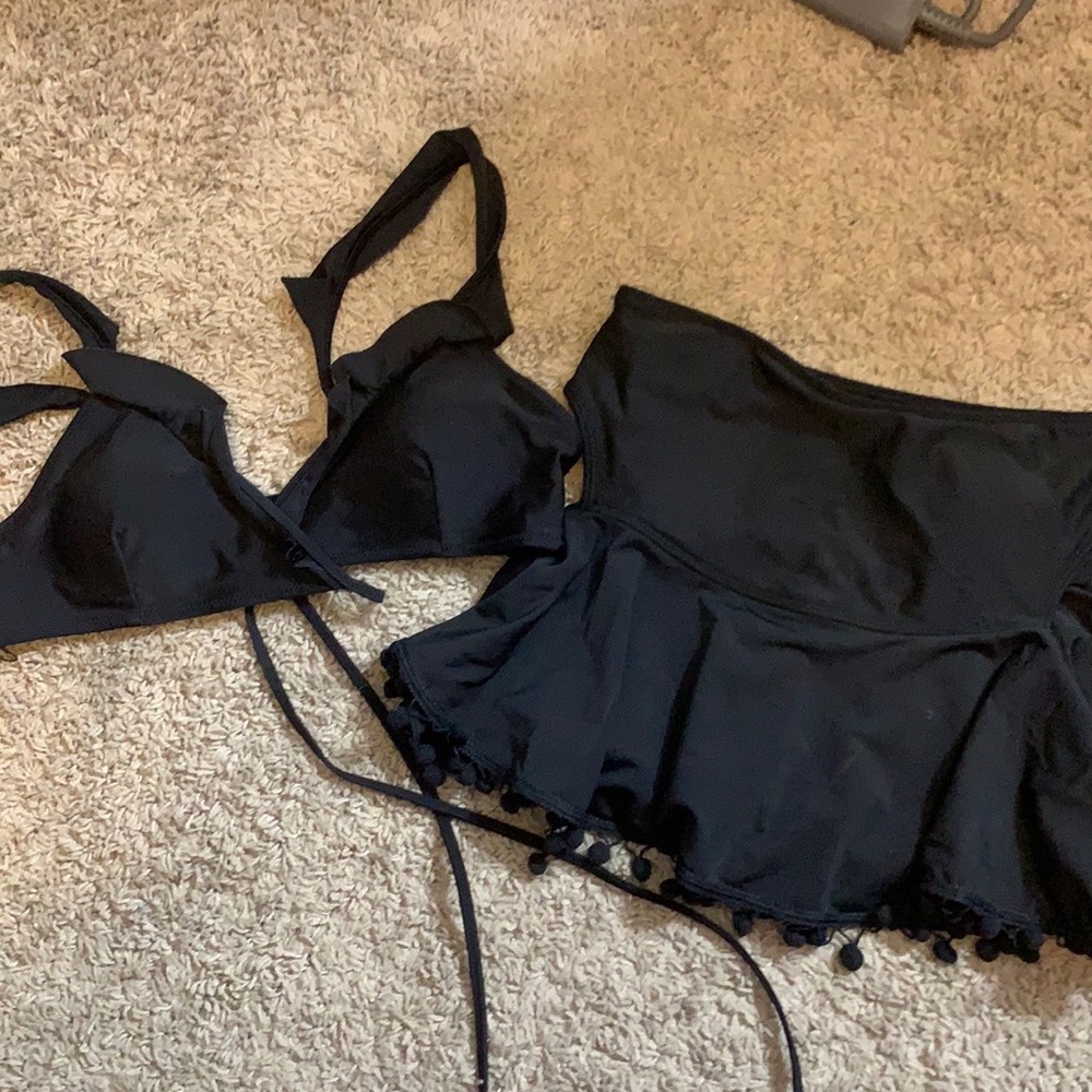 2 black bikini tops